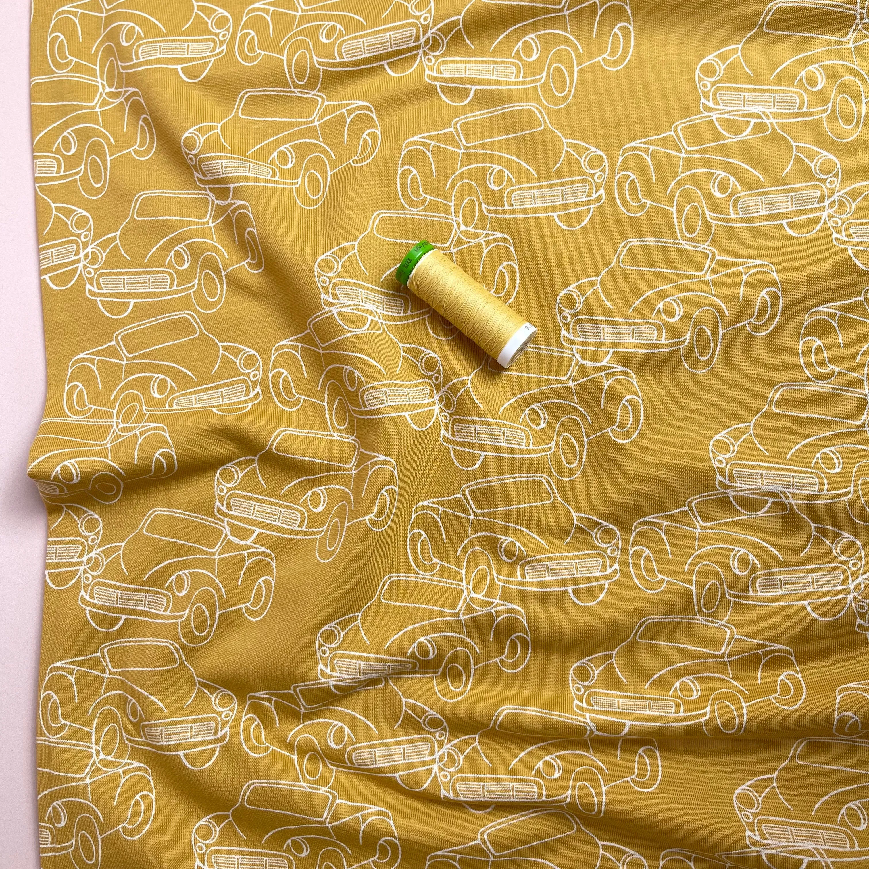 Cars in Mustard Yellow Peach Soft Cotton Sweat-shirting Fabric
